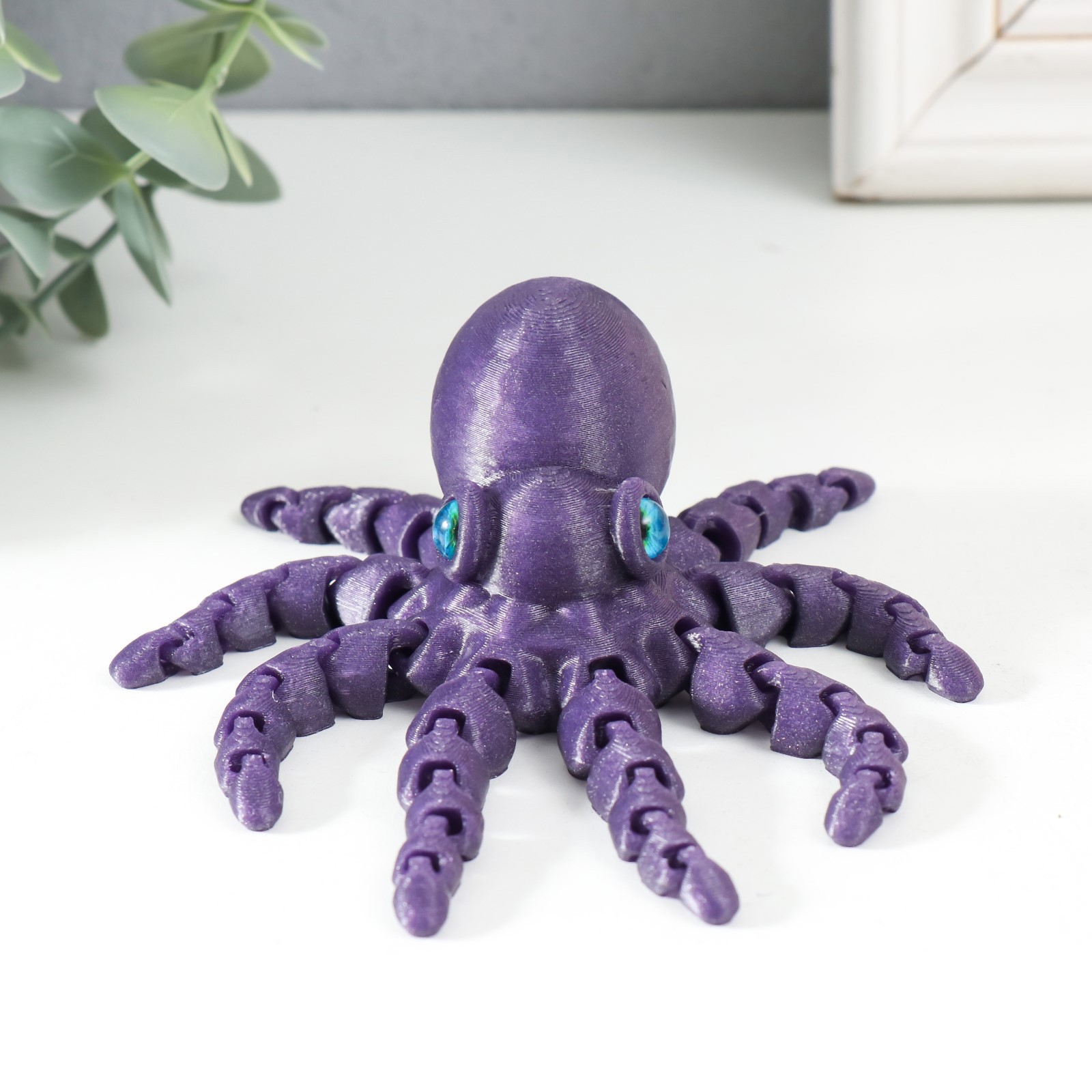 Изображение товара Сувенир-антистресс "Осьминог Ося" 13.5x13.5x4 см сиреневый