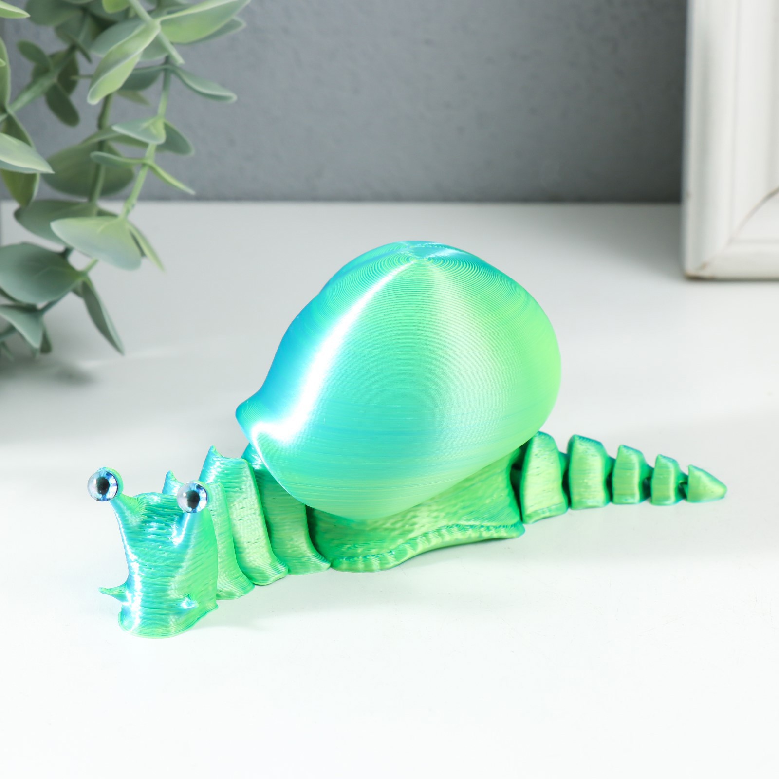 Изображение товара Сувенир-антистресс "Улитка Снэйп" 15x6x5.5 см хамелеон голубой