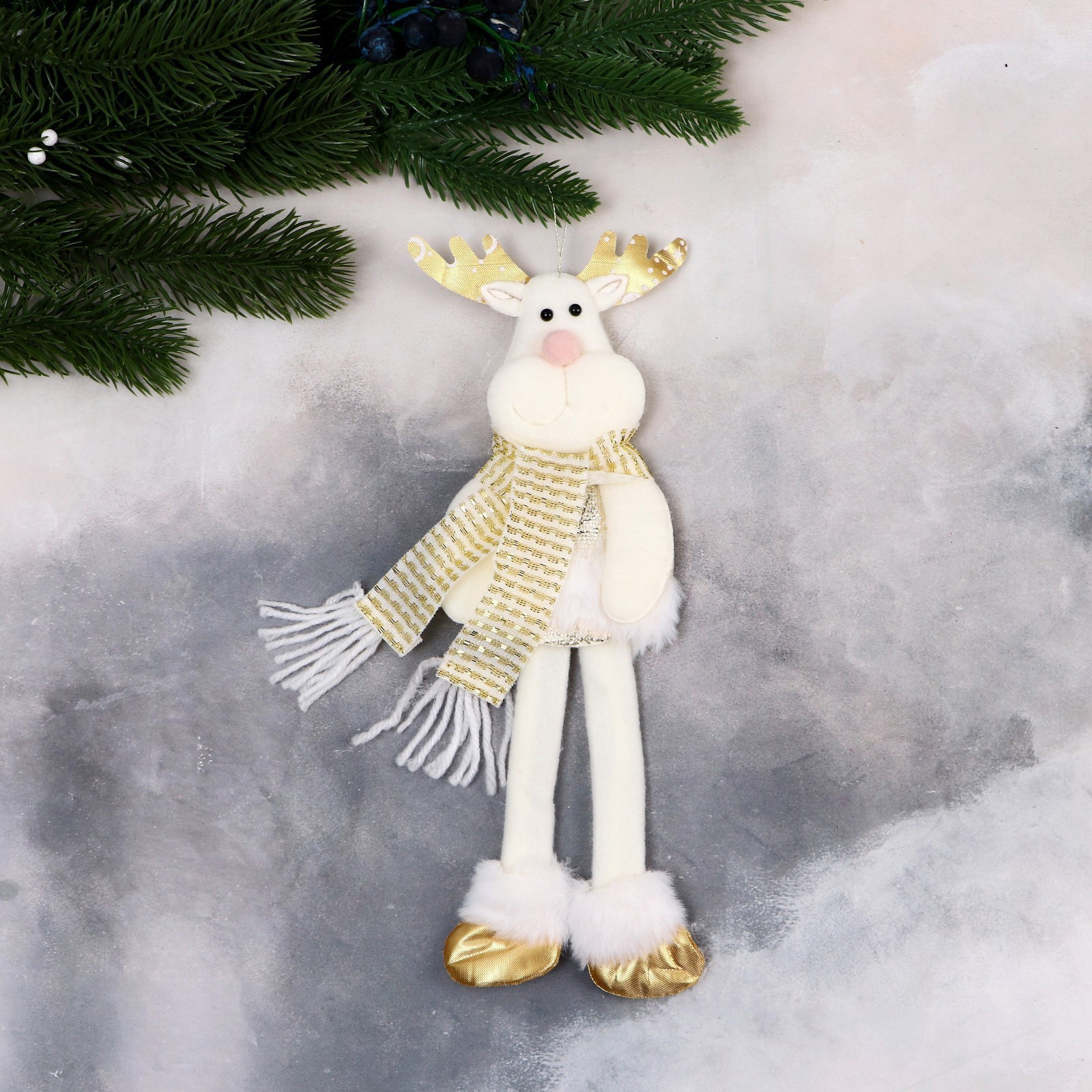Изображение товара Елочная игрушка Олень в костюмчике с геометрическим узором длинные ножки Зимнее волшебство 9692652 25 см х 25 см белый