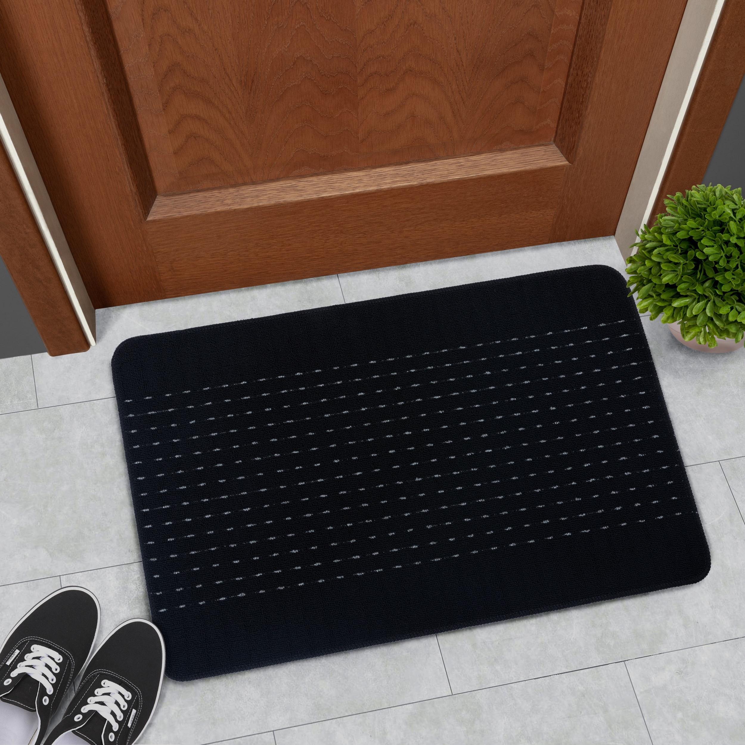 Изображение товара Декоративный коврик из полипропилена Canberra 50x80 см черный внутри помещений