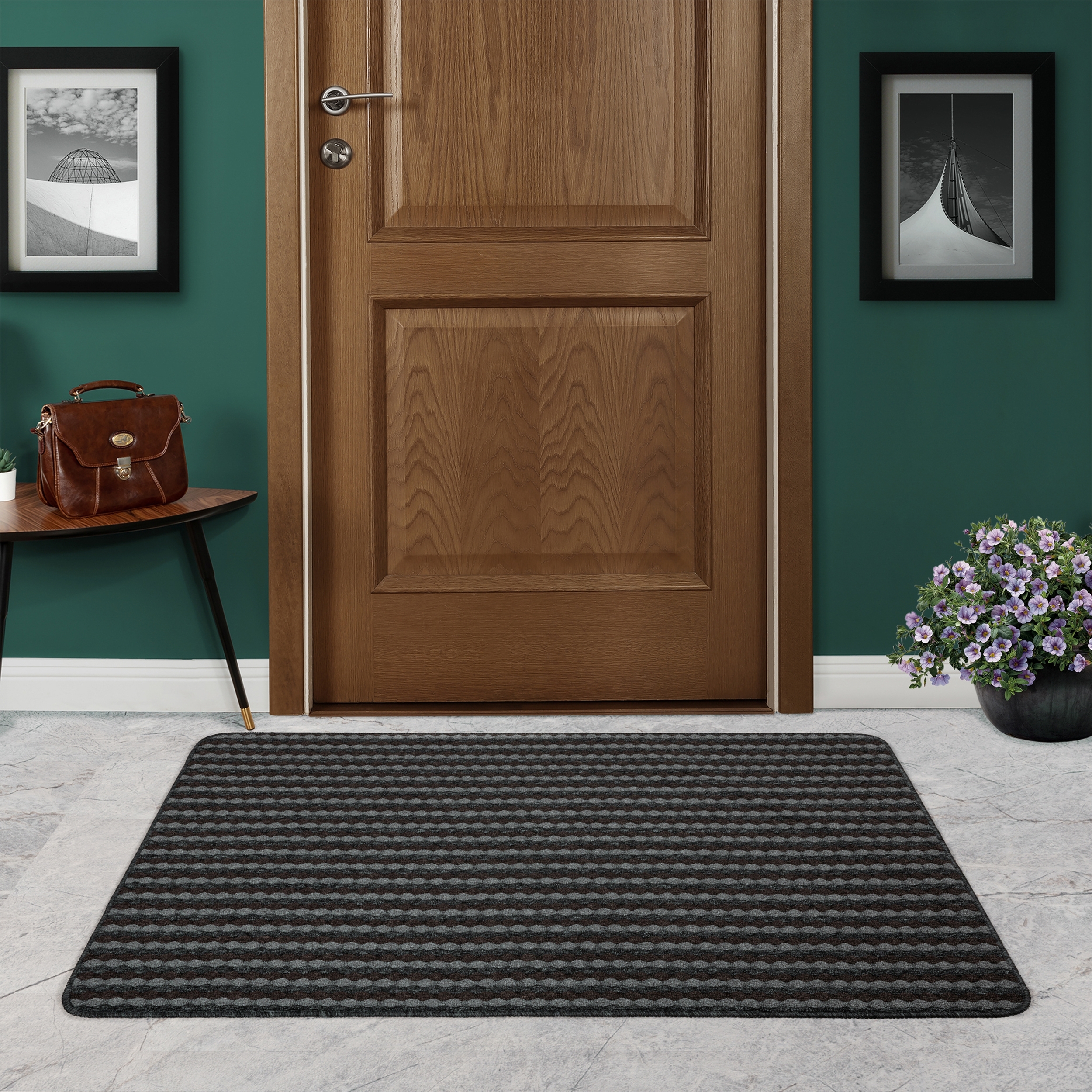 Изображение товара Декоративный коврик Bendigo из полипропилена 67x100 см черный для интерьера и прихожей