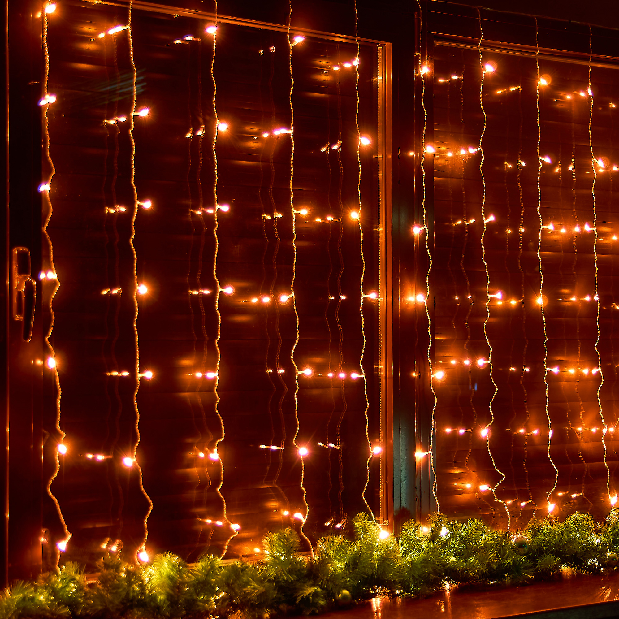Изображение товара Электрогирлянда комнатная Uniel Занавес 3x2 м янтарный цвет света 8 режимов