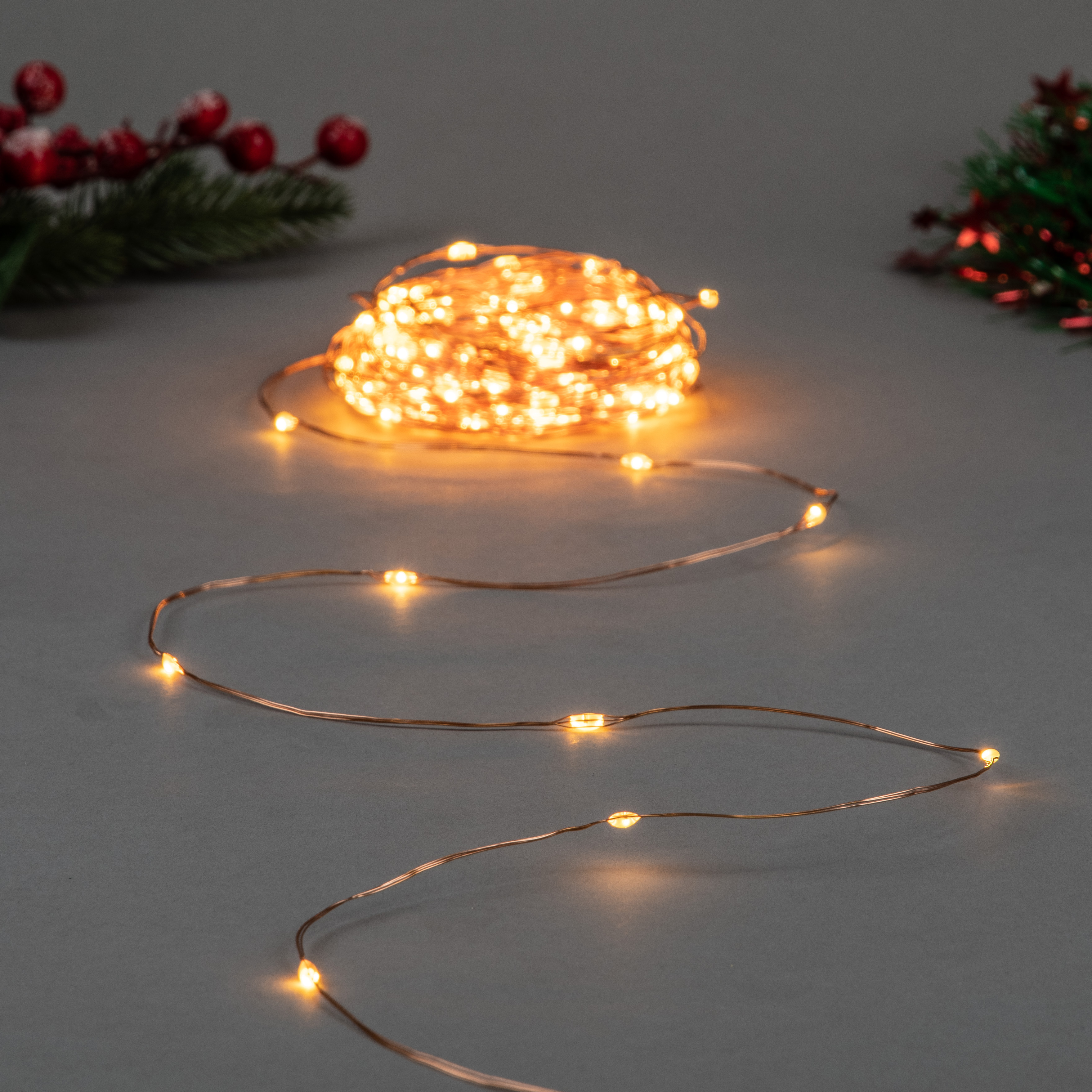 Изображение товара Гирлянда светодиодная роса UNIEL 20 м янтарный свет 8 режимов IP20