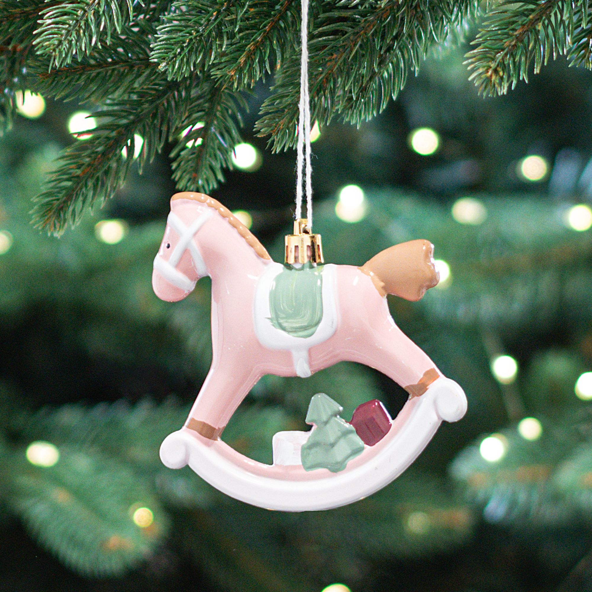 Изображение товара Декоративное подвесное украшение Лошадка 11х10 см розовое для елки и интерьера