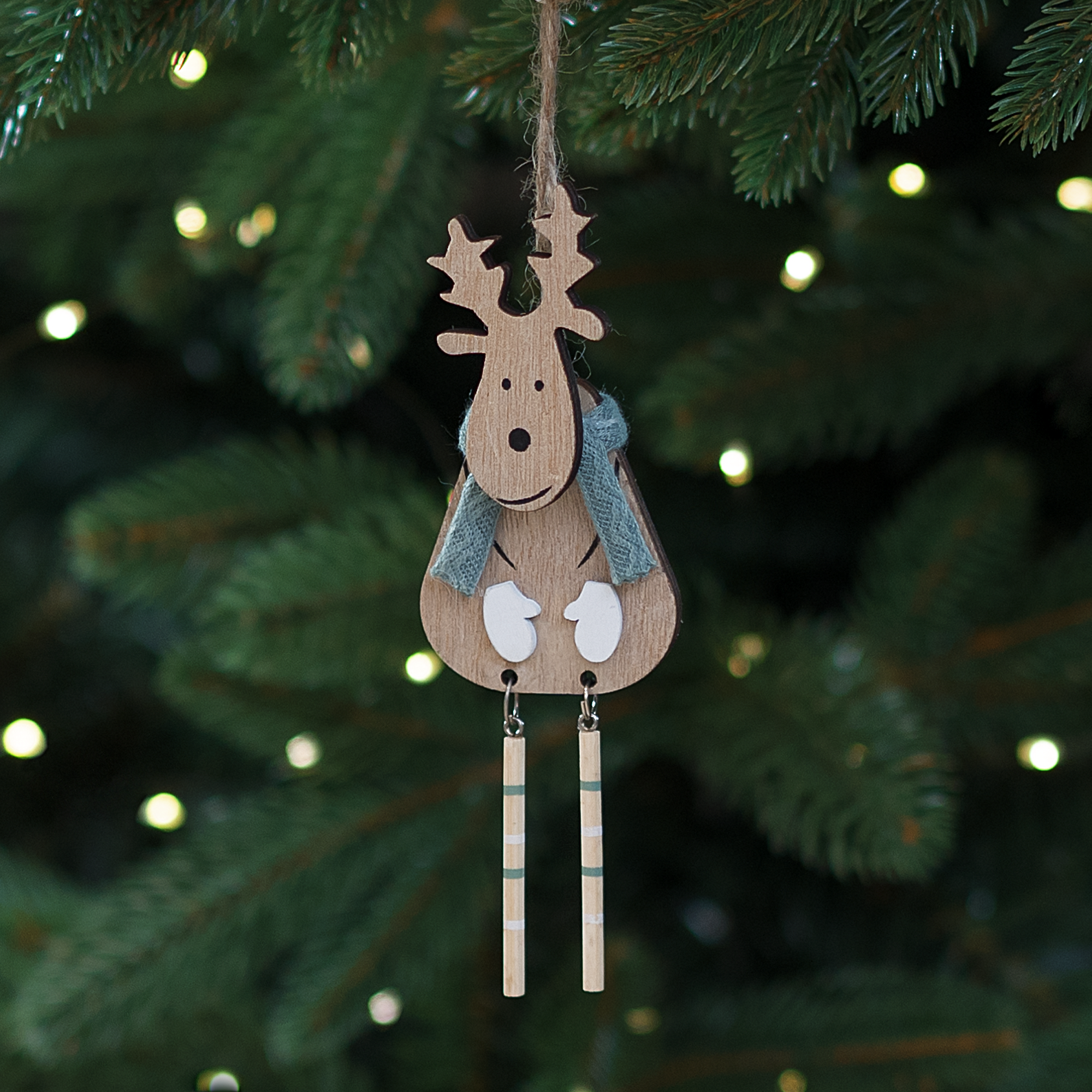 Изображение товара Елочная игрушка олень 15x5 зеленая из фанеры праздничное украшение