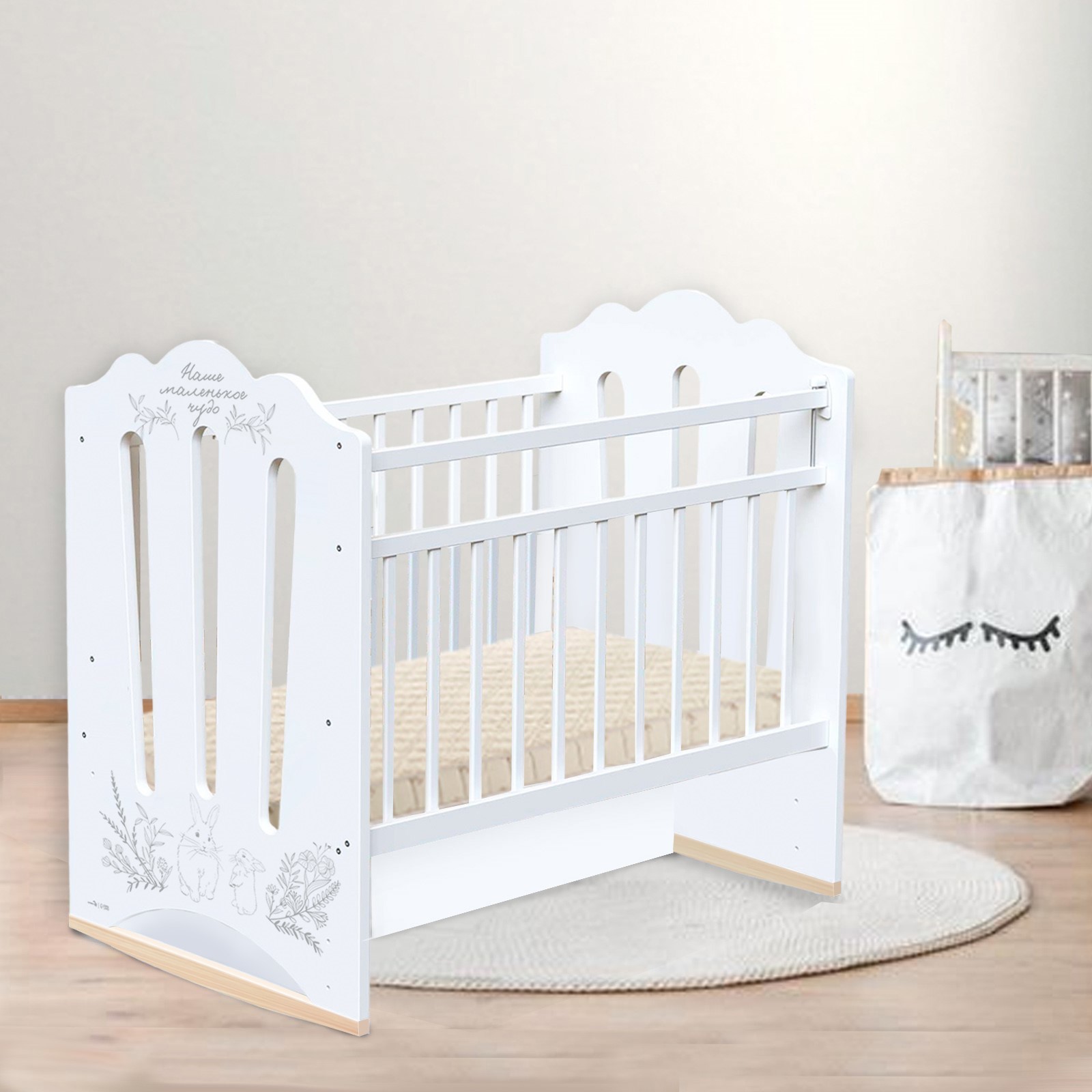 Изображение товара Детская кровать Крошка Я с маятником и колесом-качалкой 120x60 см белая