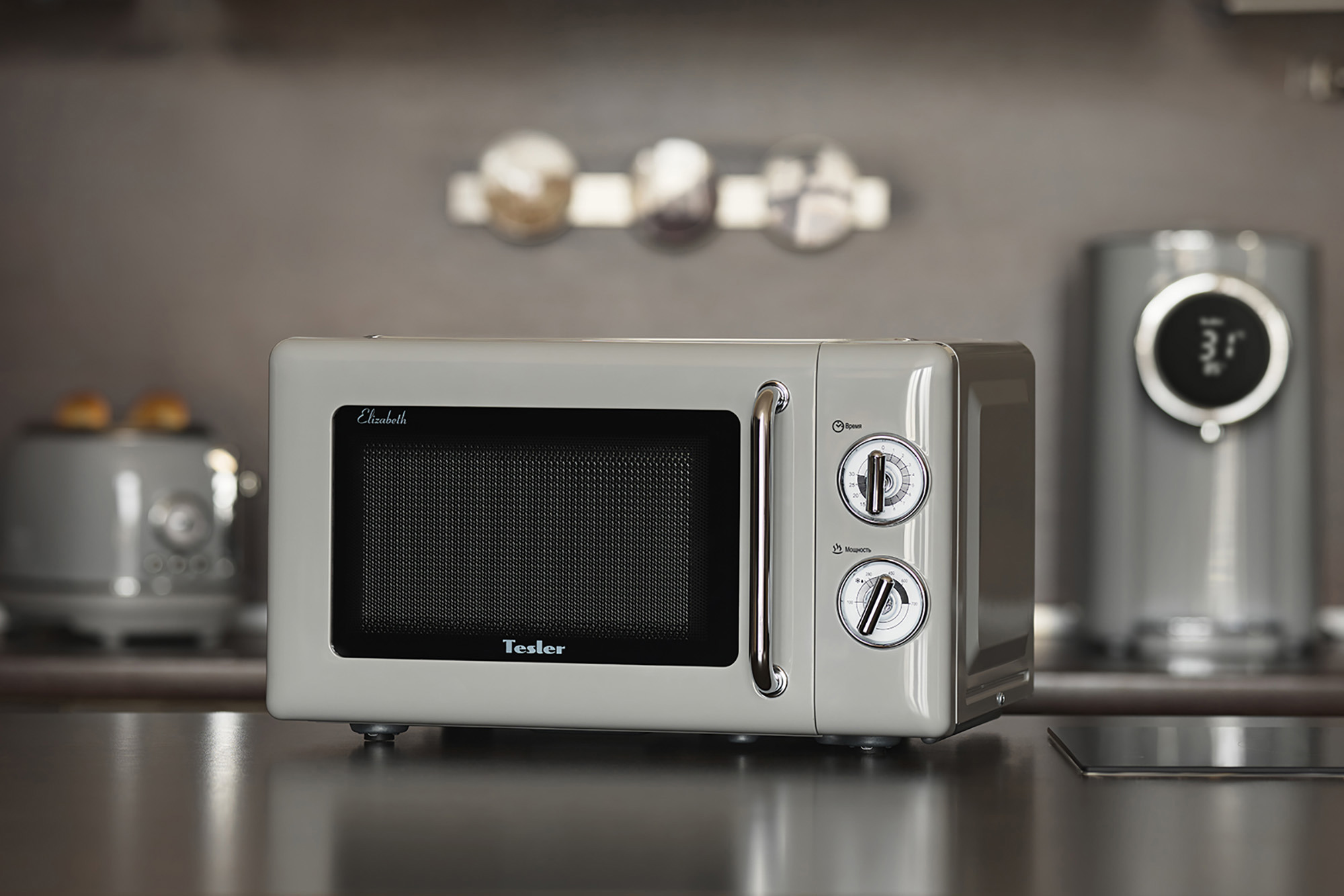 Изображение товара Микроволновая печь Tesler MM-2045 GREY 20 л компактная с механическим управлением