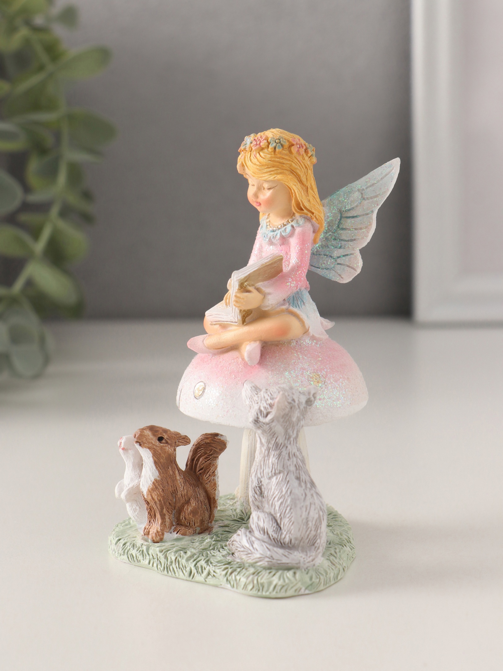 Изображение товара Сувенир полистоун Девочка-фея на грибочке читает книгу зверятам 65х6х10 см 10583329