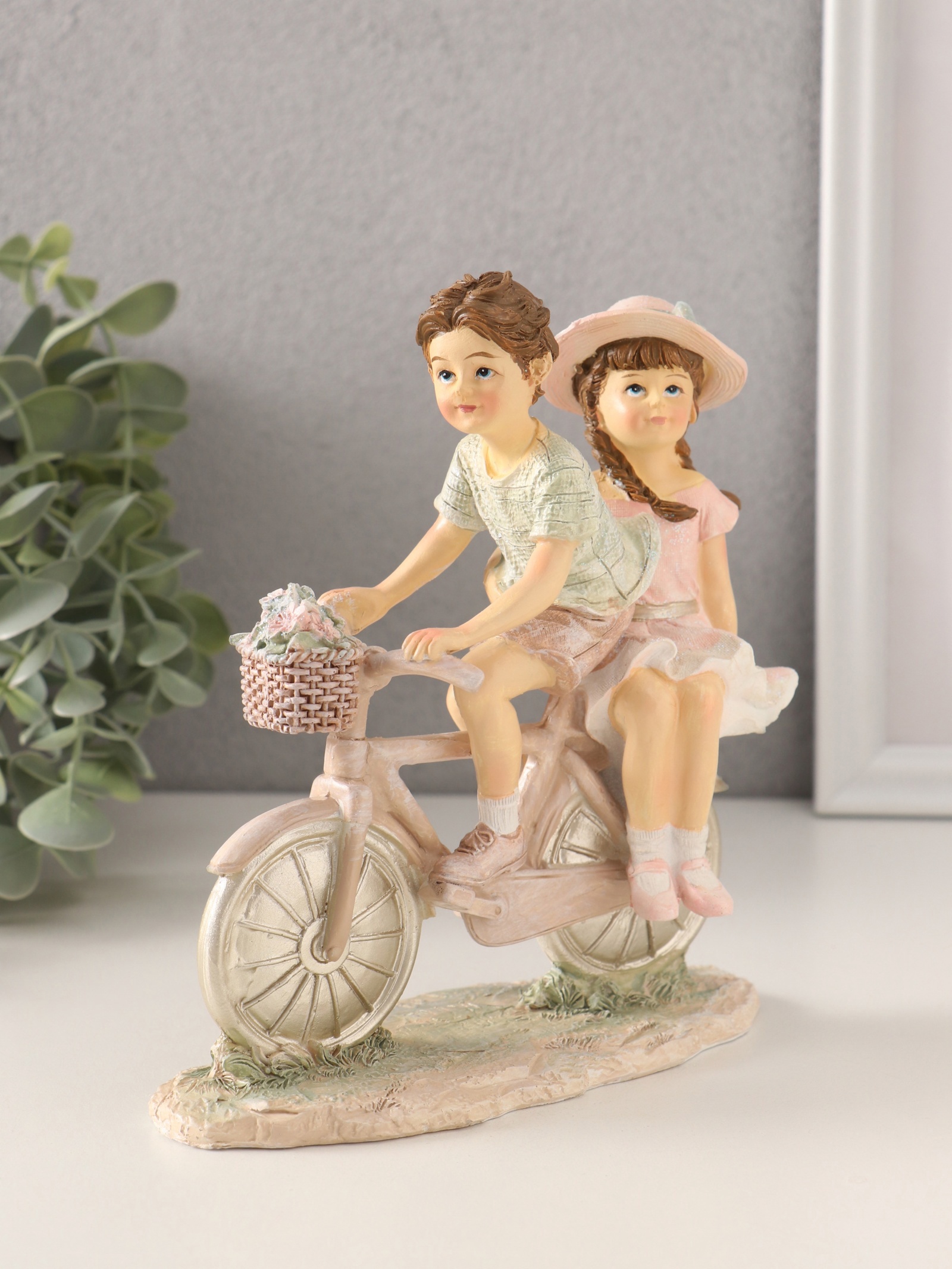 Изображение товара Сувенир полистоун Дети - катание на велосипеде розово-зелёный 145х7х165 см 10583167