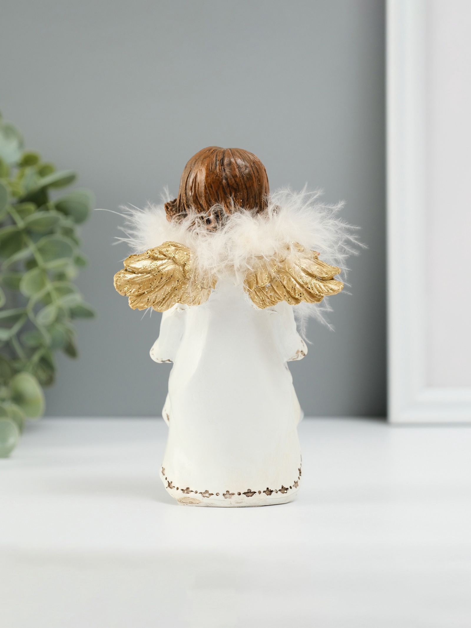 Изображение товара Ангелочек со звёздами в подоле — декоративная фигура, полистоун