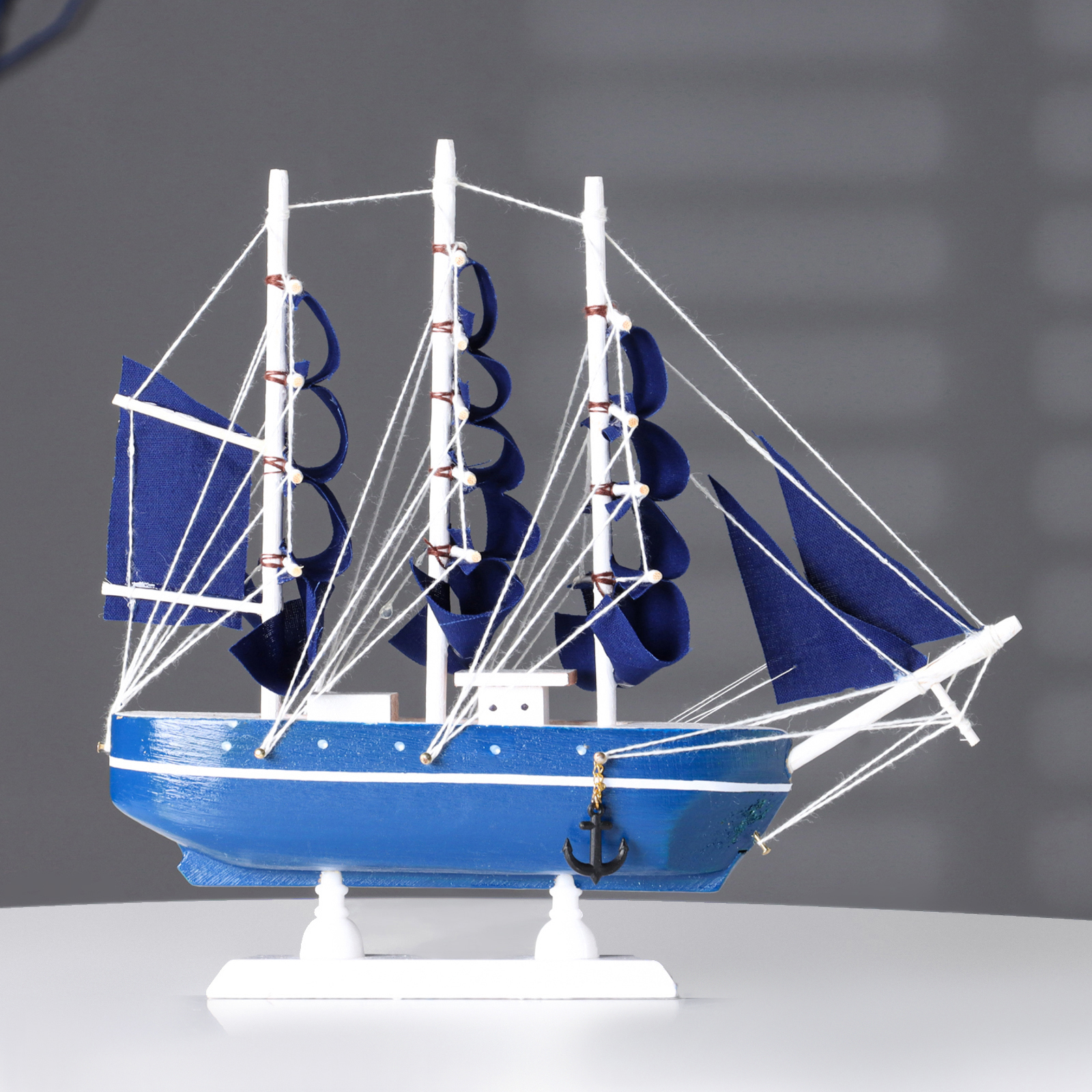 Изображение товара Корабль сувенирный малый «Дорита» борта синие с белой полосой паруса синие23×55×21 см 564176