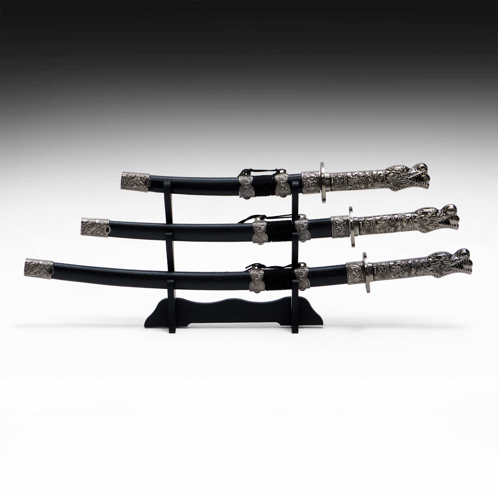 Изображение товара Сув. изделие катаны 3в1 на подставке ножны кожзам голова дракона черные 45/52/61см 454259