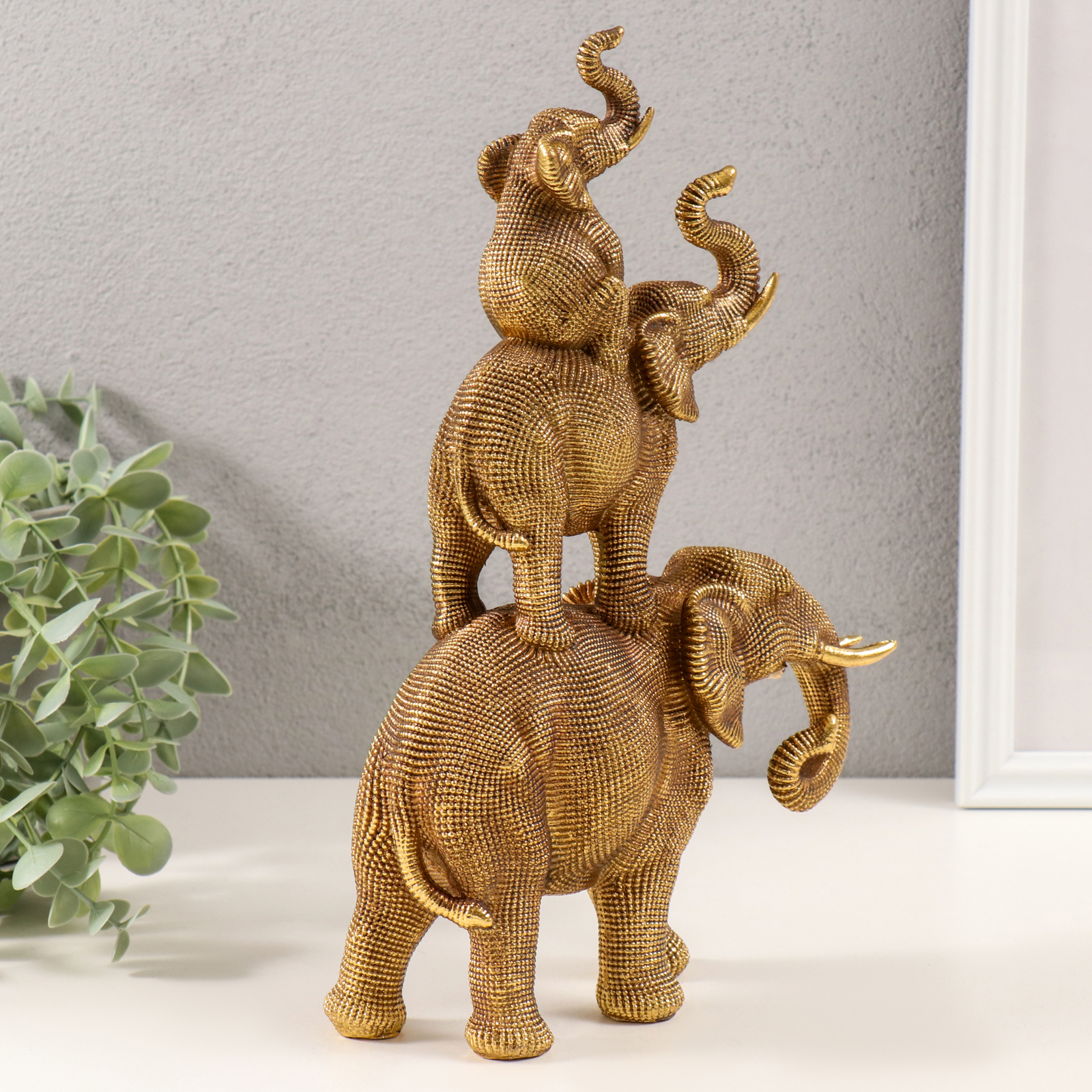 Изображение товара Сувенир полистоун 3D Пирамида из слонов тёмное золото 20х7х30 см 10203901