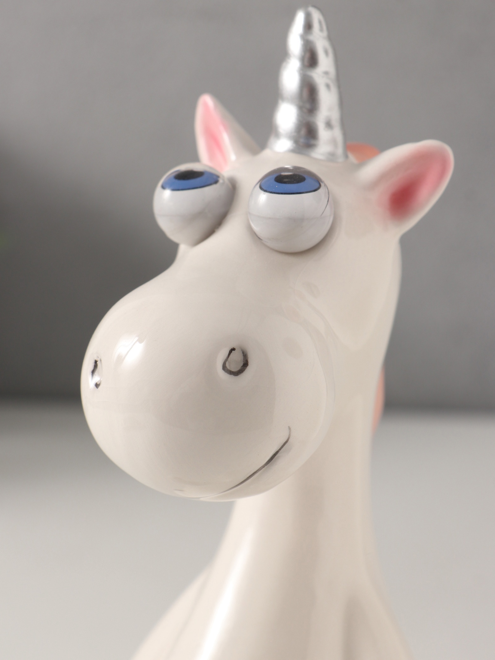 Изображение товара Копилка керамическая Единорожик-пучеглаз 9х10 см