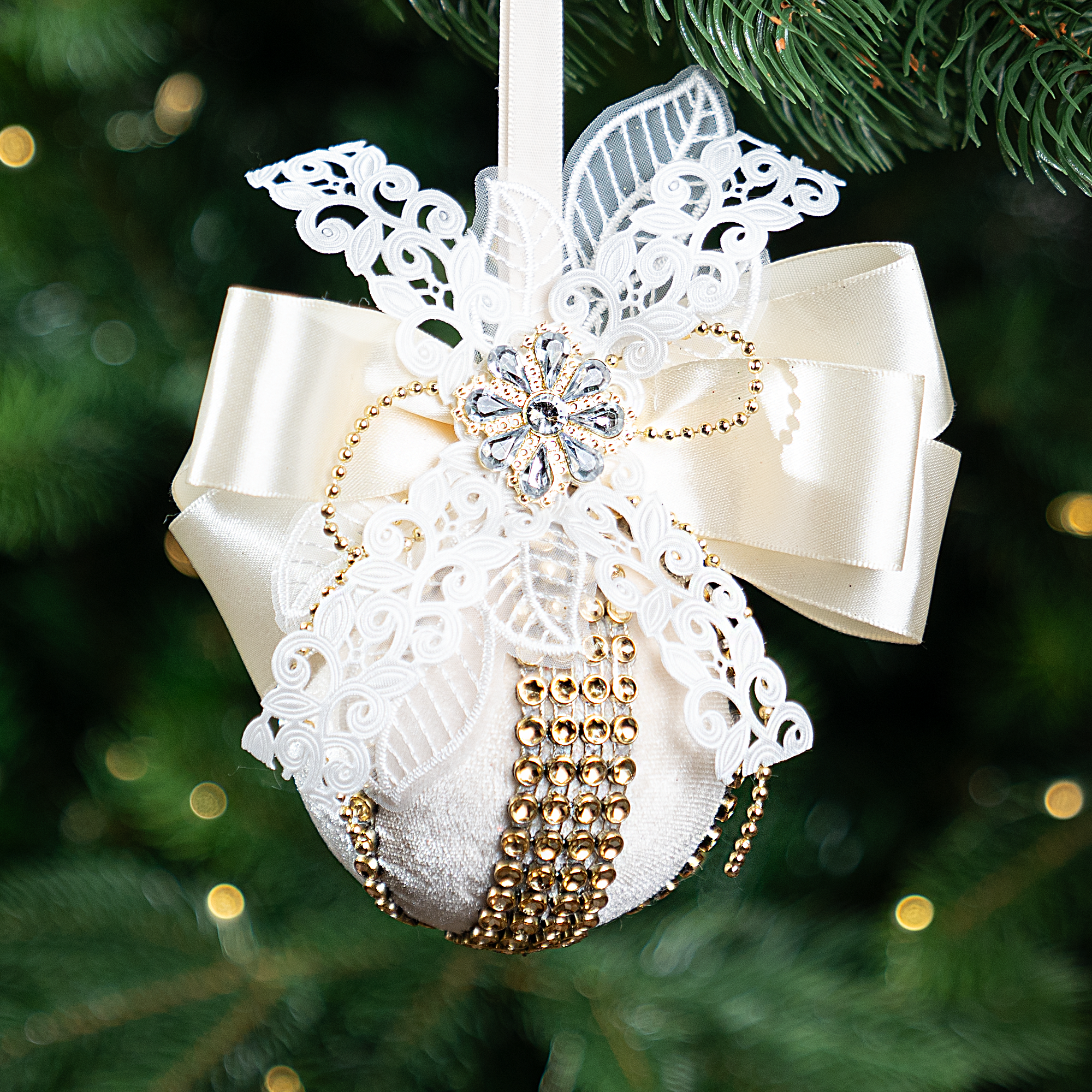 Изображение товара Елочный шар KREAFORTA ø13 см шампань с бантом блестящий украшение для елки