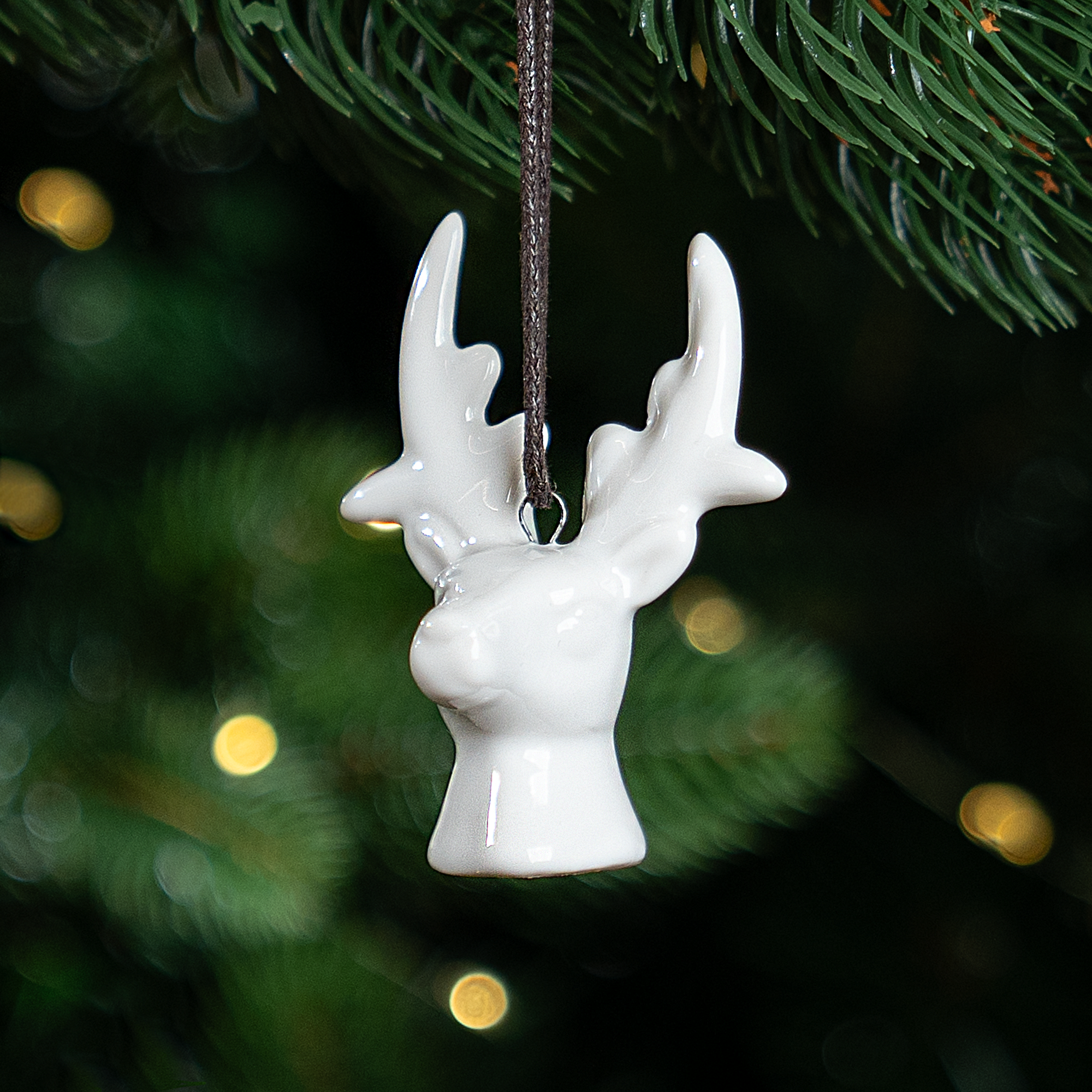 Изображение товара Декоративное украшение KREAFORTA Олень 7 см белый для новогоднего декора