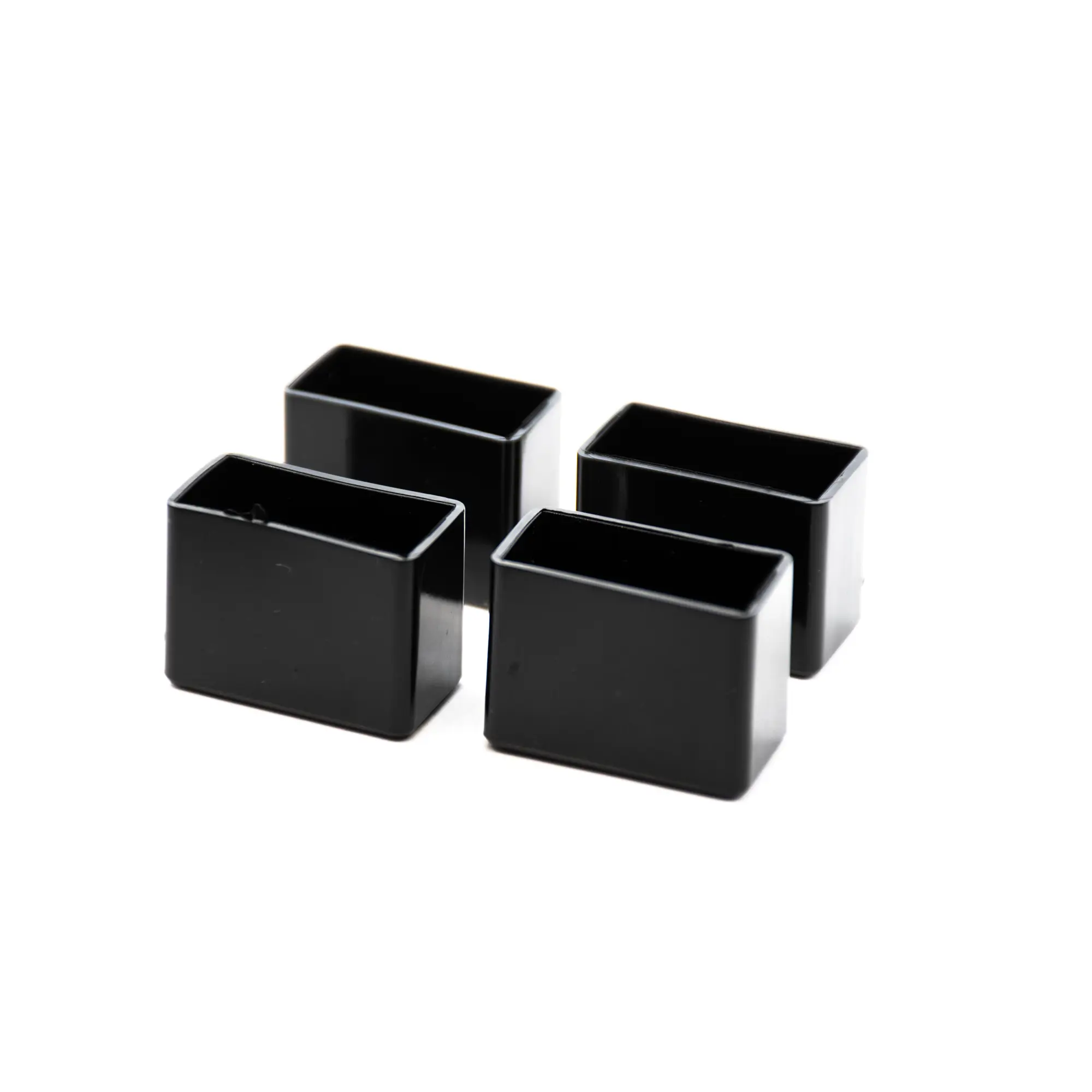 Заглушка на мебельную ножку KONSENSA 15x30 мм прямоугольные пластик цвет черный 4 шт.