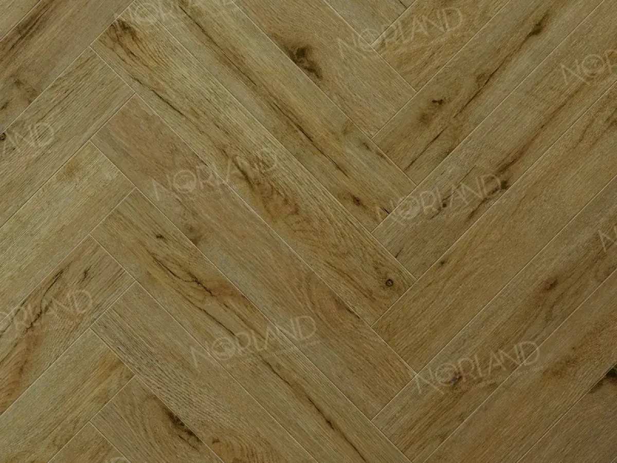 Изображение товара Ламинат NORLAND Herringbone Elegant Strong дуб скай 12мм 34 класс фаска 1.32м2