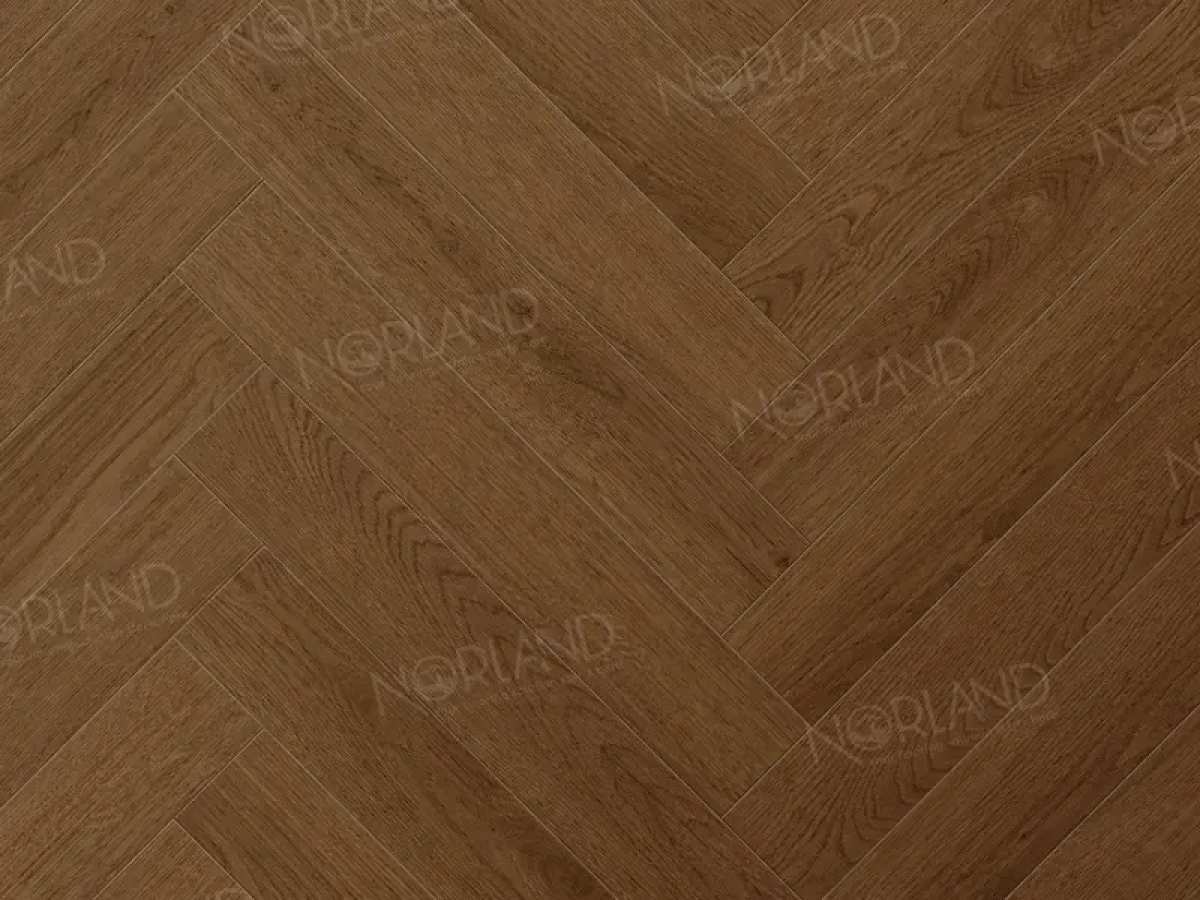 Изображение товара Ламинат Norland Herringbone Elegant Strong Дуб Этна 12 мм 60х10 см фаска 4 стильное покрытие