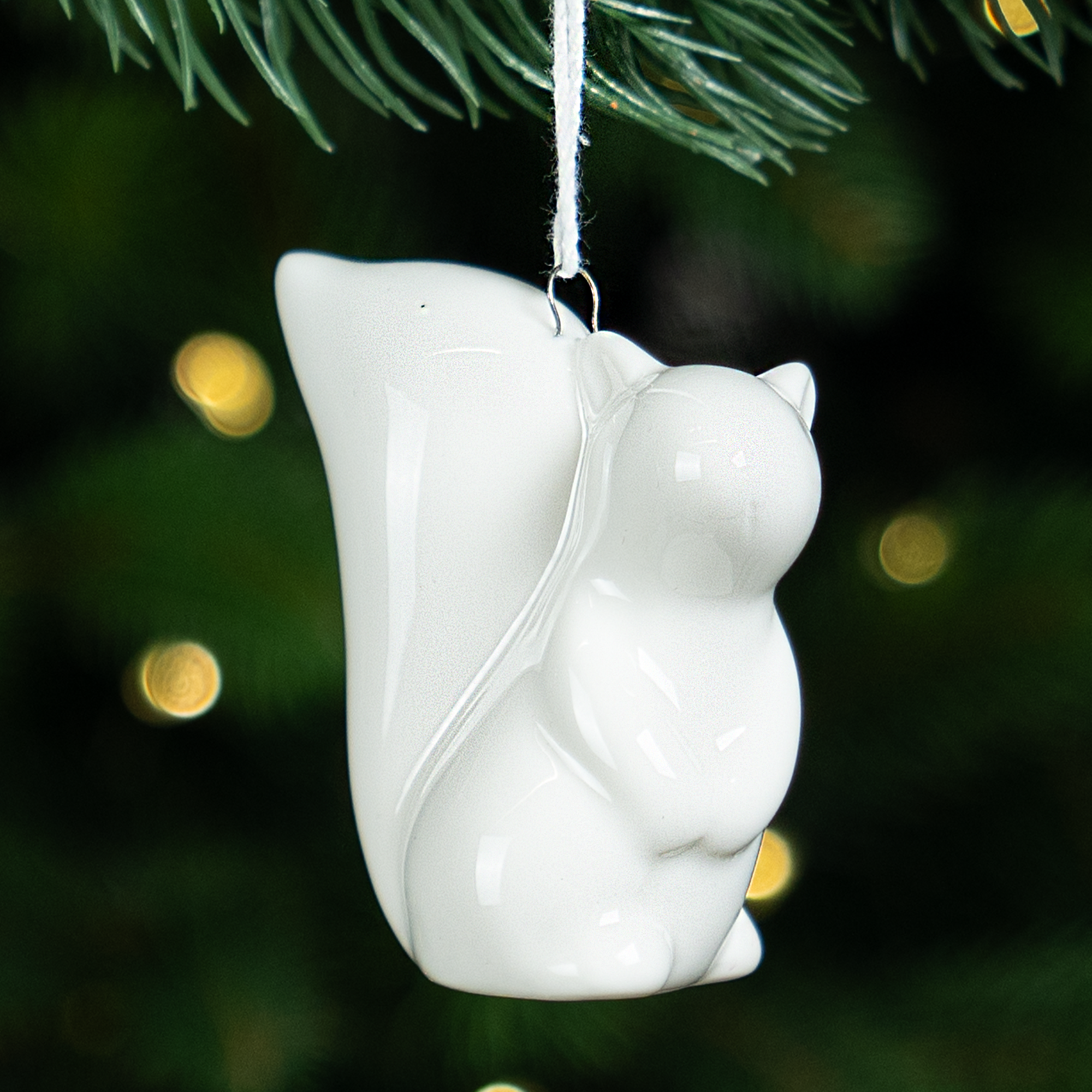 Изображение товара Декоративная ёлочная игрушка KREAFORTA Белка 7 см белая для новогоднего декора